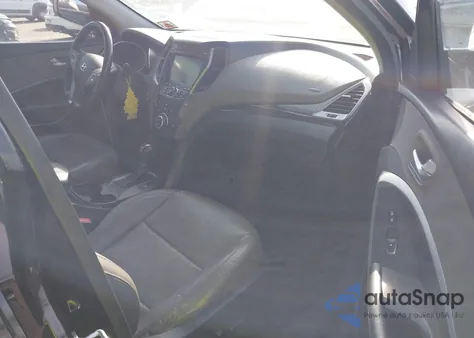 2014 Hyundai Santa Fe Sport 2.4L z USA, uszkodzony, nr VIN 5XYZUDLB8EG231293